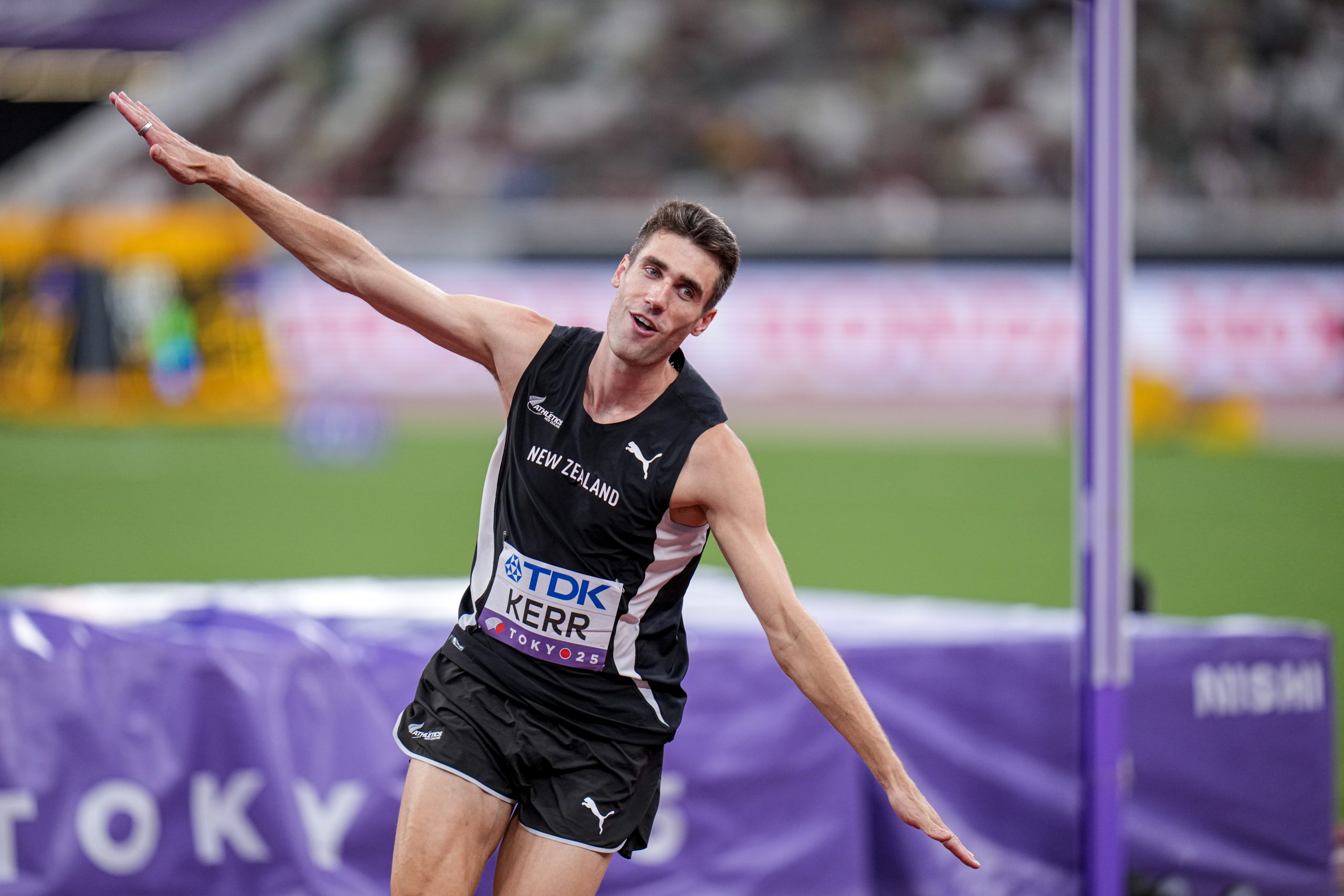 Woo gets silver in high jump to swell Asian tally